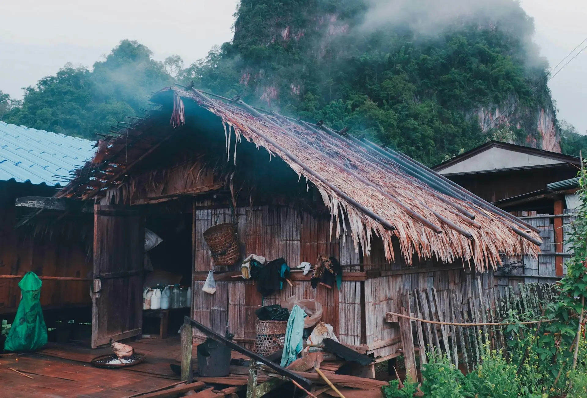 brown wooden house near the mountain